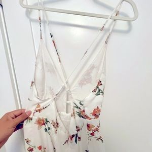 Strapped white jumper with flowers